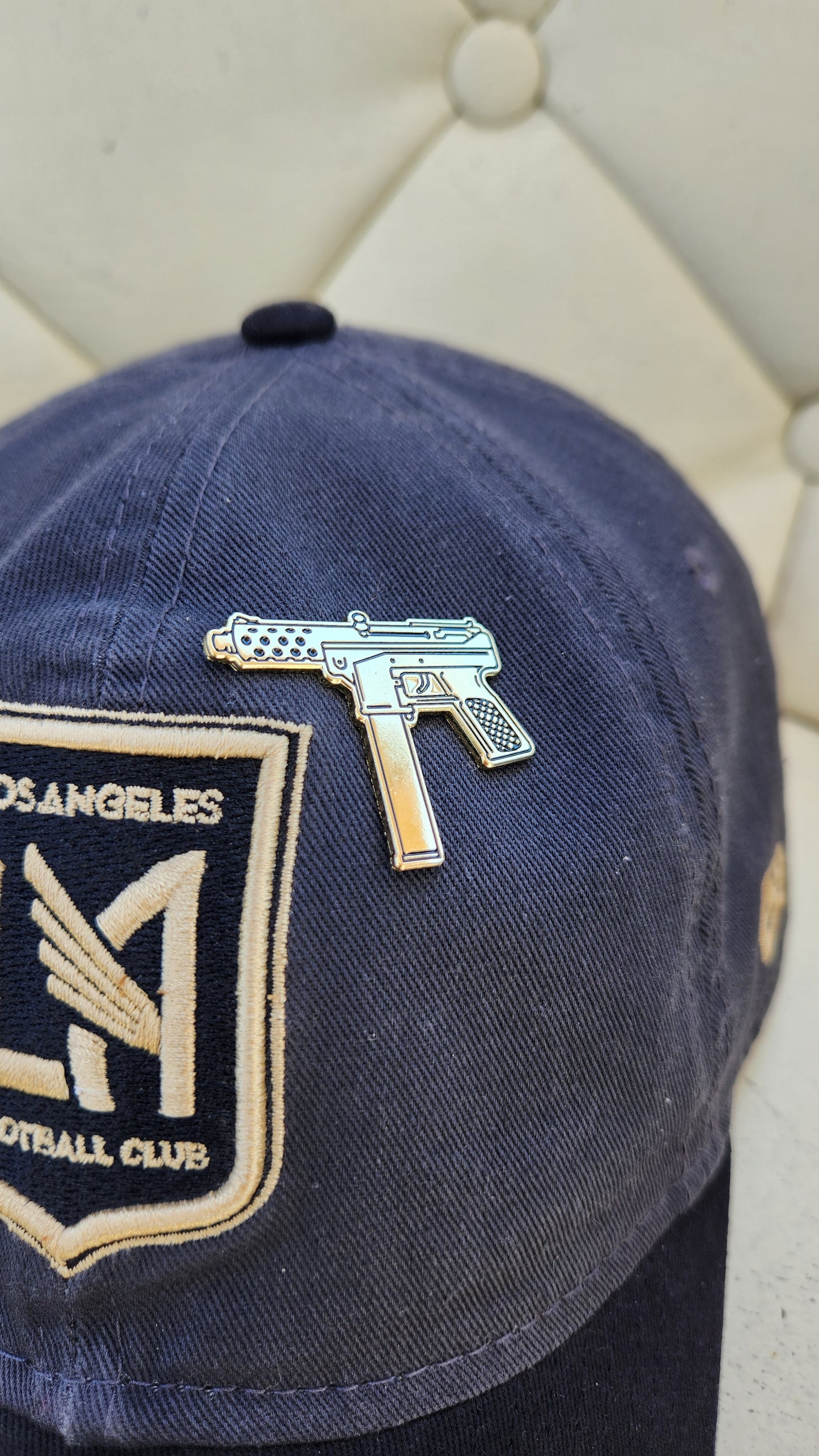 Assault rifle hat pin