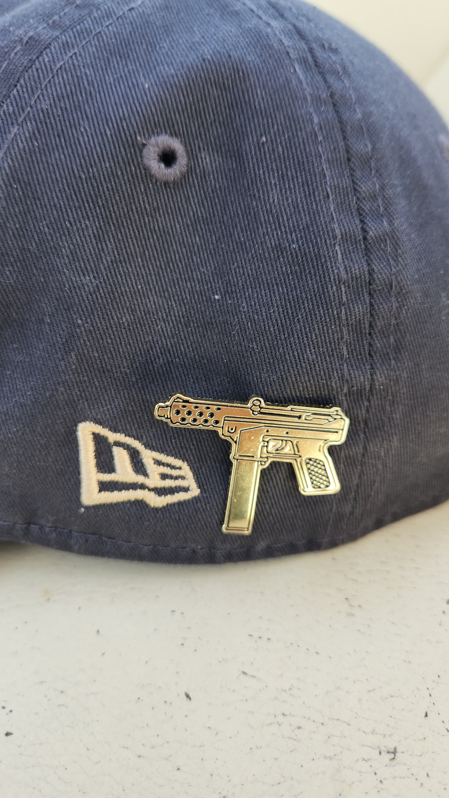 Assault rifle hat pin